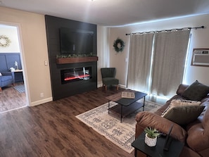 Living Area with Fireplace and Patio