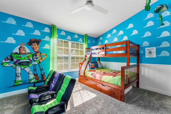 Bedroom 3: Toy Story Themed Kids Room with Bunk Beds, Trundle, and Ensuite.