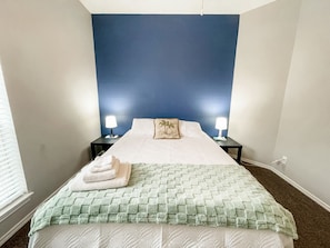 Slide into this comfortable queen size bed, and get a great night's rest. A medium sized closet is perfect to tuck away any belongings and suitcases to keep your essentials organized.