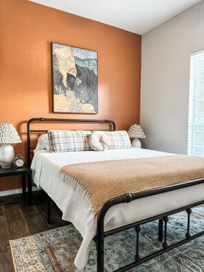 Enjoy a cozy getaway in our inviting queen bedroom, where fresh linens are ready for you!
