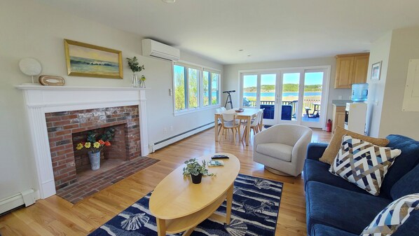 Living room with comfortable seating and views of Chipmans Cove