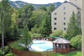 Outdoor pool with a great view of the resort, available during the summer months.