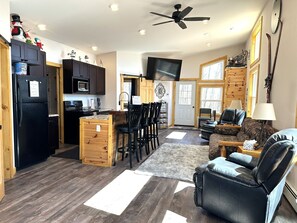 Living Room, Kitchen, and Dining Area