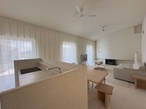 open-concept living and dining area