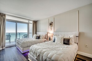 Luxurious bedroom, chic design, and oceanfront views!