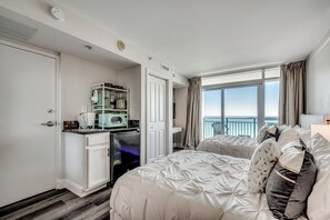 Oceanfront bedroom, plush beds, and convenient kitchenette!