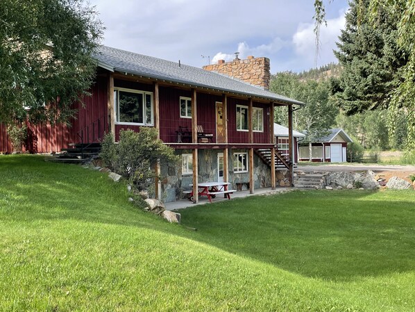 Front of the two story home. Deck and Sunlight basement.