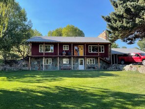 Large lawn in both front and back of the house