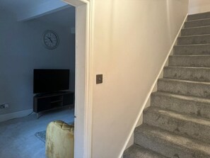 View of the sitting room/staircase