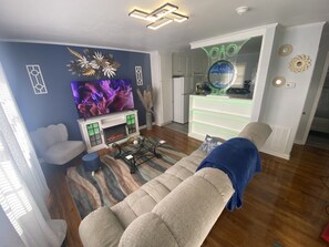 65in Roku TV, Indoor Fireplace, Custom Interactive Art and lighting, board games