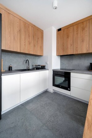 Fully Equipped Kitchen with Dining Area| Book Now with RENTUJEMY.COM