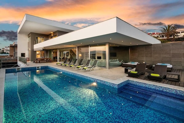 Pool and villa in the evening