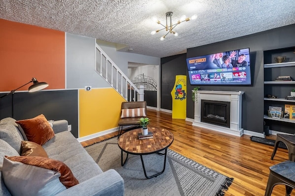 Thoughtfully designed to be both welcoming and functional. This space features a large Smart TV, accessible for everyone to enjoy, whether for movie nights, streaming favorite shows, or keeping up with the latest news.