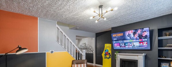 Thoughtfully designed to be both welcoming and functional. This space features a large Smart TV, accessible for everyone to enjoy, whether for movie nights, streaming favorite shows, or keeping up with the latest news.