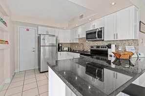 Fully stocked kitchen with plenty of counter space.