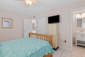 Master bedroom with Queen bed, TV and ensuite bathroom.