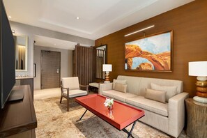 Living area. Exact unit will be assigned upon arrival. Views, colors, and decor may vary.