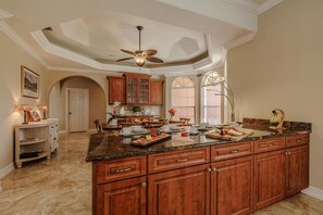 Kitchen Charm - - Prepare meals with ease on the granite countertops in this elegant kitchen
- Enjoy the cozy dining nook with natural light streaming through large windows
- Perfect for hosting gatherings, family breakfasts, and creating culinary delights