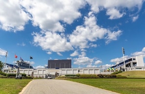 main entrance of the stadium across the street at the end of the lower driveway!