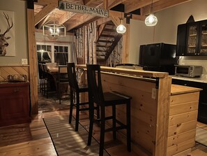 Open kitchen, dining living room makes for a great place to cook.
