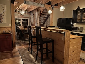 Open kitchen, dining living room makes for a great place to cook.
