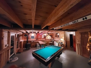 Plenty of fun for everyone. Extra sleeping in the game room Twin trundle beds.