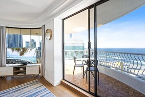 Spacious living area is right next to the balcony overlooking the ocean