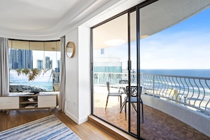 Spacious living area is right next to the balcony overlooking the ocean