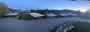 5 of the 7 Cabins in a Semicircle Formation, Each Facing a Different S, SW or Westerly Direction