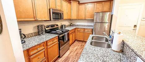 Kitchen with lots of storage, cleaning closet and pantry 