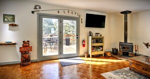 Back door to deck, wood stove