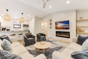 Relaxation central! Sink into the sofa, catch your favorite shows on the TV, and gather around for cozy evenings in our inviting living room.