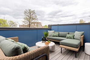 Private outdoor space with comfortable lounge seating.