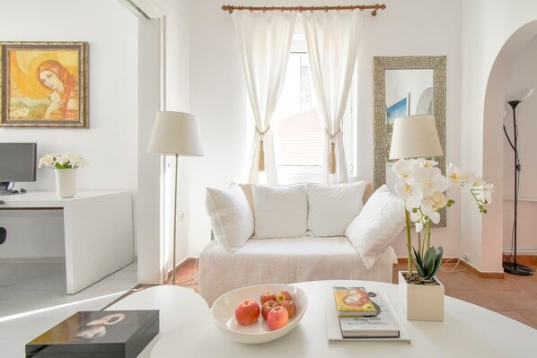 Step into a serene oasis with our sunlit studio, where every detail has been curated for your comfort. Lounge on the plush sofa amidst chic decor, reflecting the charm of Sofia. If this looks like your kind of retreat, send us a message—we'd love to hear from you!