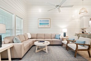 Bright  living area perfect for relaxing, playing games, and making memories together!
