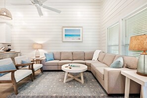 Bright living area perfect for relaxing, playing games, and making memories together!