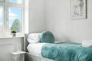 Green and White theme Twin Room