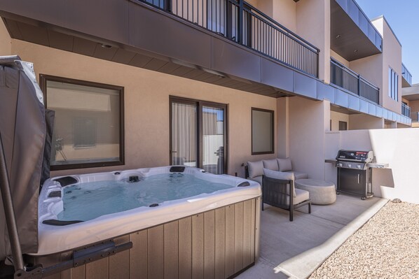 Back Patio Hot Tub - Relax in your own private hot tub, located on the back patio.