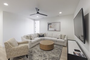 Upstairs Living Area - Watch your favorite show and relax in the Living Room after a long day of adventures.