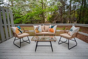 Private back porch with furniture!