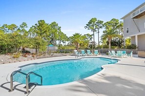 Large saltwater pool, lots of outdoor furniture and immaculate landscaping