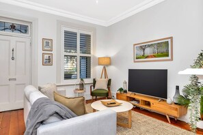 Kick back in the living room on the soft lounge while enjoying your favourite show on the large HD TV. 
