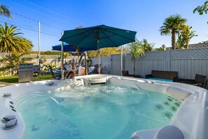Patio w/Dining Table, BBQ, Sitting Area, Hammock, Spa, and Shade Sails