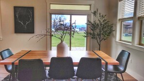 Enjoy the lake views from the dinning table as well as your expansive backyard!