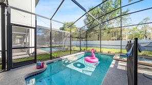 Swimming pool in a glass enclosure with inflatable