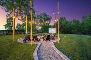 Make memories around the firepit while enjoying your favorite movie.
