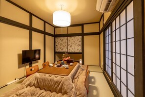 2F Living Room, 2 single futons can be placed here if needed. Living/Kotatsu area You can draw 2 single futons here.