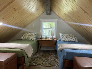 Loft with two twin beds for the young at heart and not so tall. 