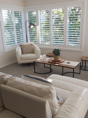 Lounge area middle floor looking out over our magnificent Magnolia tree