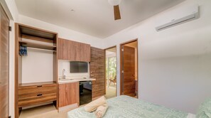 The room also features a sink and mini fridge for added convenience